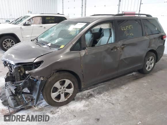 2014 Toyota Sienna LE AAS with VIN 5TDKK3DC5ES416638, listed as a IAAI auction lot 42685892 with 202,889 mi miles and . Bid and sale history available at DreamBid. Image 2.