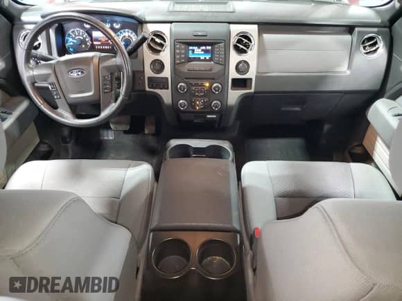 2014 Ford F-150 XL с VIN 1FTFX1ETXEFC45259, выставлен на аукционе Copart как лот 70955975 с пробегом 106 327 миль миль и Списание • Salvage title. История ставок и продаж доступна на DreamBid. Изображение 8.