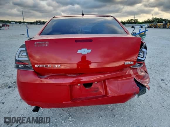 2013 Chevrolet Impala LTZ с VIN 2G1WC5E35D1244215, выставлен на аукционе Copart как лот 83877625 с пробегом 185 391 миль миль и Списание • Salvage title. История ставок и продаж доступна на DreamBid. Изображение 6.