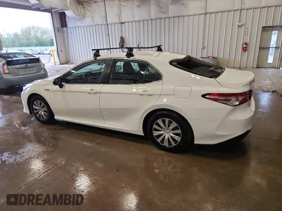 2019 Toyota Camry Hybrid LE с VIN 4T1B31HK3KU006491, выставлен на аукционе Copart как лот 81571085 с пробегом 83 074 миль миль и Списание • Salvage title. История ставок и продаж доступна на DreamBid. Изображение 2.