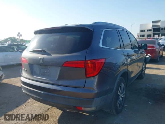 2017 Honda Pilot EX-L with VIN 5FNYF5H67HB030603, listed as a IAAI auction lot 43037104 with 94,827 mi miles and . Bid and sale history available at DreamBid. Image 4.