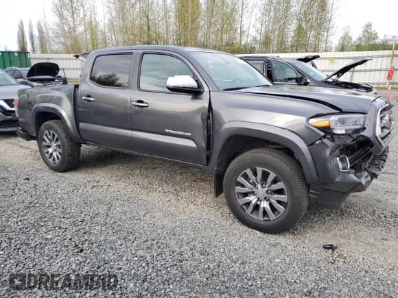 2022 Toyota Tacoma Limited with VIN 3TMGZ5AN4NM528267, listed as a Copart auction lot 52534795 with 40,559 mi miles and Salvage title. Bid and sale history available at DreamBid. Image 4.