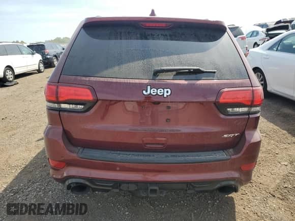 2016 Jeep Grand Cherokee SRT с VIN 1C4RJFDJ9GC373086, выставлен на аукционе Copart как лот 71247225 с пробегом 128 057 миль миль и Списание • Salvage title. История ставок и продаж доступна на DreamBid. Изображение 6.