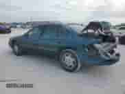 1997 Chevrolet Lumina LS with VIN 2G1WL52M1V9120300, listed as a Copart auction lot 87460394 with 142,588 mi miles and Salvage title. Bid and sale history available at DreamBid. Image 2.