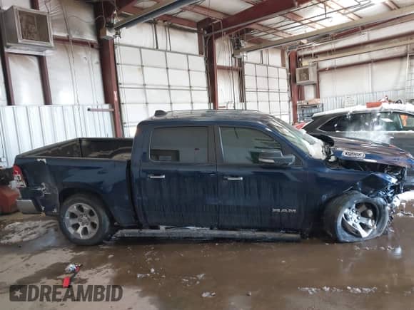 2020 Ram 1500 Big Horn z VIN 1C6SRFFT7LN218907, wystawiony jako IAAI lot #41608010 z przebiegiem 78 998 mil mil oraz . Historia ofert i sprzedaży dostępna na DreamBid. Obrazek 13.