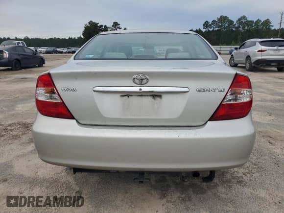 2004 Toyota Camry LE z VIN 4T1BE32K24U816888, wystawiony jako Copart lot #70691535 z przebiegiem 194 215 mil mil oraz Szkoda całkowita • Salvage title. Historia ofert i sprzedaży dostępna na DreamBid. Obrazek 6.