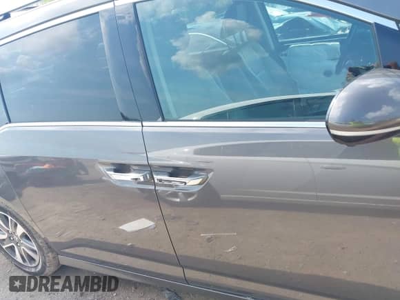 2016 Honda Odyssey Touring Elite z VIN 5FNRL5H97GB034558, wystawiony jako IAAI lot #42862918 z przebiegiem 118 891 mil mil oraz . Historia ofert i sprzedaży dostępna na DreamBid. Obrazek 14.