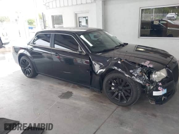 2006 Chrysler 300 C SRT-8 с VIN 2C3LA73W96H534951, выставлен на аукционе IAAI как лот 43338254 с пробегом 93 972 миль миль и . История ставок и продаж доступна на DreamBid. Изображение 1.