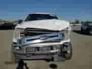 2018 Ford F-150 XLT z VIN 1FTEW1EG9JFA19483, wystawiony jako Copart lot #80747525 z przebiegiem 91 561 mil mil oraz Szkoda całkowita • Salvage title. Historia ofert i sprzedaży dostępna na DreamBid. Obrazek 13.