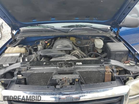 2004 GMC Sierra 1500 SLE z VIN 2GTEK13T941319242, wystawiony jako Copart lot #51701475 z przebiegiem Nie podano mil oraz Czysty tytuł • Clean title. Historia ofert i sprzedaży dostępna na DreamBid. Obrazek 11.