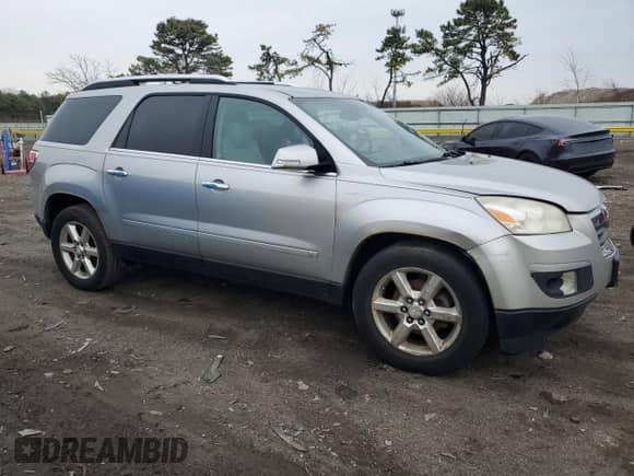 2007 Saturn Outlook XR with VIN 5GZER33777J107300, listed as a Copart auction lot 53284005 with 170,590 mi miles and Clean title. Bid and sale history available at DreamBid. Image 4.