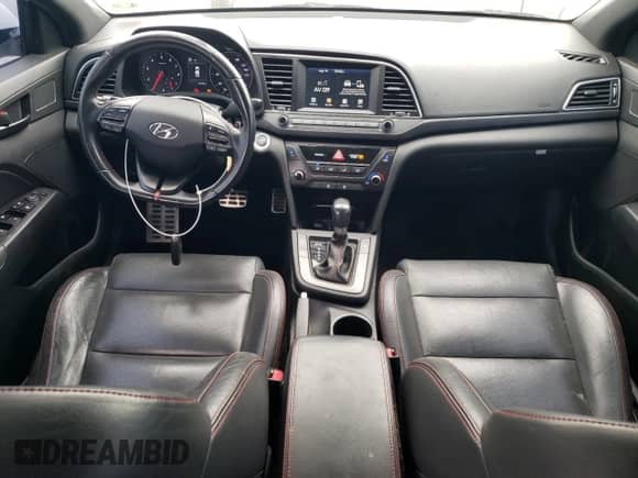2018 Hyundai Elantra Sport с VIN KMHD04LB3JU506630, выставлен на аукционе Copart как лот 69346575 с пробегом 94 789 миль миль и Списание • Salvage title. История ставок и продаж доступна на DreamBid. Изображение 8.