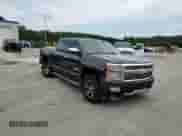2014 Chevrolet Silverado 1500 High Country с VIN 3GCUKTEJ3EG543750, выставлен на аукционе Copart как лот 70409245 с пробегом Не указан миль и Списание • Salvage title. История ставок и продаж доступна на DreamBid. Изображение 13.