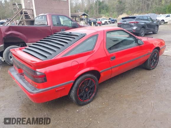 1989 Dodge Daytona with VIN 1B3XG24J5KG136306, listed as a IAAI auction lot 42179601 with 131,083 mi miles and . Bid and sale history available at DreamBid. Image 4.