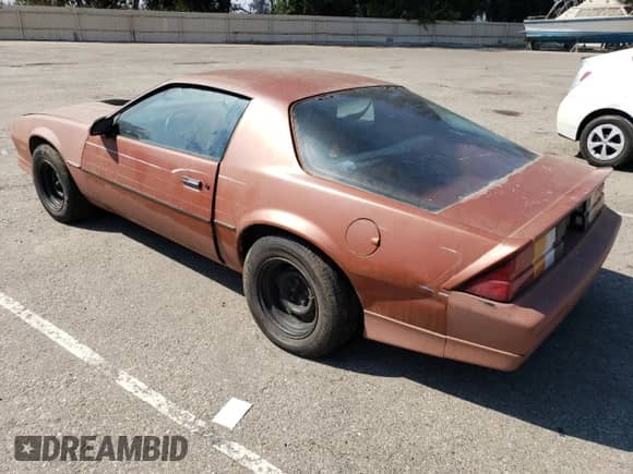 1985 Chevrolet Camaro Z28 Sport with VIN 1G1FP87H4FL450945, listed as a Copart auction lot 75465654 with 90,716 mi miles and Clean title. Bid and sale history available at DreamBid. Image 2.