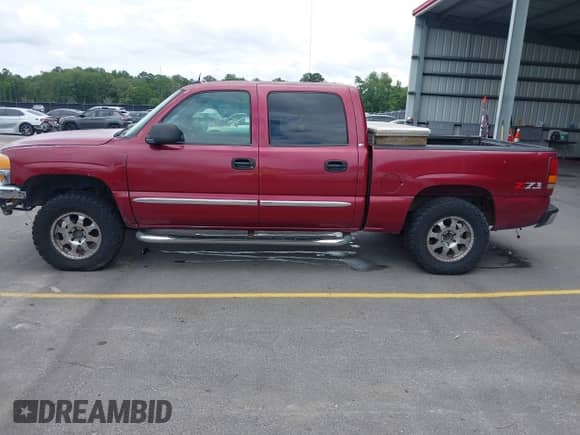 2004 GMC Sierra 1500 SLE z VIN 2GTEK13TX41417048, wystawiony jako IAAI lot #42403447 z przebiegiem 222 760 mil mil oraz . Historia ofert i sprzedaży dostępna na DreamBid. Obrazek 14.