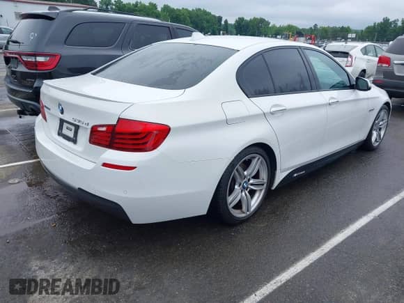 2014 BMW 5 Series 535d with VIN WBAXA5C53ED690727, listed as a IAAI auction lot 42344800 with 128,153 mi miles and . Bid and sale history available at DreamBid. Image 4.