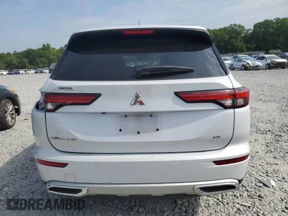 2022 Mitsubishi Outlander SE with VIN JA4J3UA82NZ088506, listed as a Copart auction lot 54781715 with 83,889 mi miles and Salvage title. Bid and sale history available at DreamBid. Image 6.