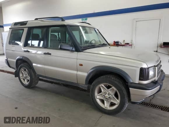 2000 Land Rover Discovery Cloth with VIN SALTY1541YA261319, listed as a Copart auction lot 86040445 with 153,917 mi miles and Clean title. Bid and sale history available at DreamBid. Image 4.