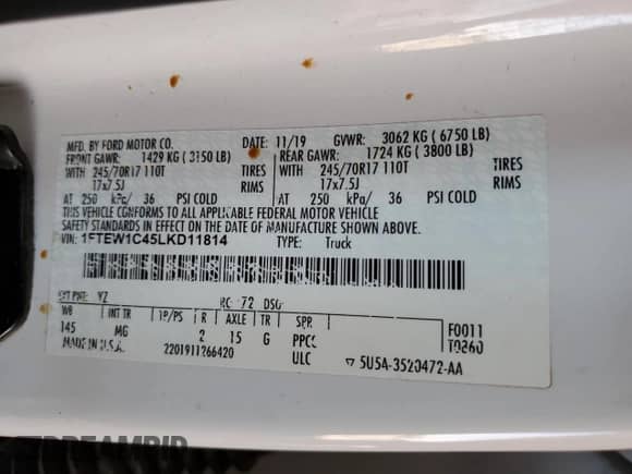 2020 Ford F-150 XL with VIN 1FTEW1C45LKD11814, listed as a Copart auction lot 69002595 with 106,500 mi miles and Salvage title. Bid and sale history available at DreamBid. Image 12.