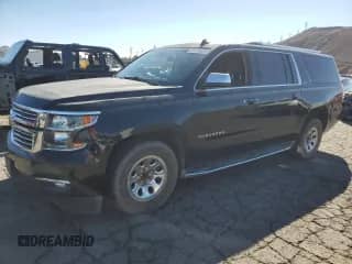 2015 Chevrolet Suburban LTZ с VIN 1GNSCKKC8FR145169, выставлен на аукционе Copart как лот 87014825 с пробегом 172 308 миль миль и Чистый • Clean title. История ставок и продаж доступна на DreamBid. Изображение 1.