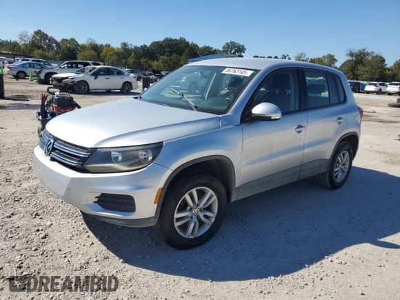 2014 Volkswagen Tiguan S z VIN WVGAV3AX7EW621724, wystawiony jako Copart lot #86763145 z przebiegiem 148 678 mil mil oraz Czysty tytuł • Clean title. Historia ofert i sprzedaży dostępna na DreamBid. Obrazek 1.