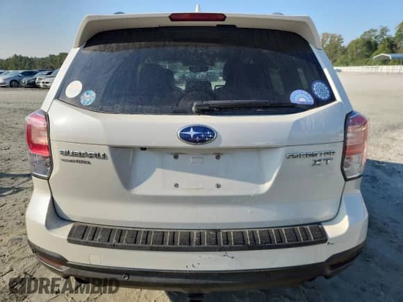 2017 Subaru Forester Touring z VIN JF2SJGWCXHH542608, wystawiony jako Copart lot #80816115 z przebiegiem 147 233 mil mil oraz Szkoda całkowita • Salvage title. Historia ofert i sprzedaży dostępna na DreamBid. Obrazek 6.