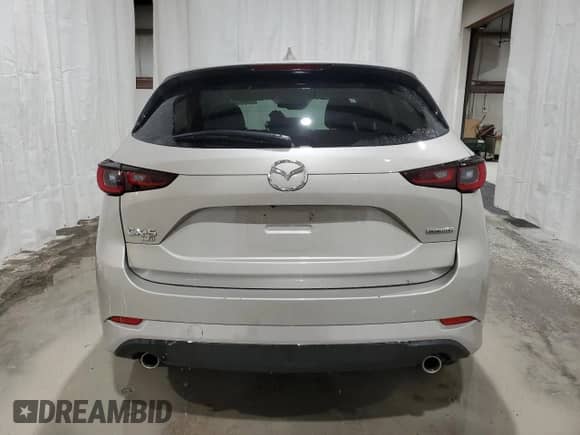 2025 Mazda CX-5 S Select z VIN JM3KFBBLXS0690411, wystawiony jako Copart lot #90328315 z przebiegiem Nie podano mil oraz Szkoda całkowita • Salvage title. Historia ofert i sprzedaży dostępna na DreamBid. Obrazek 6.