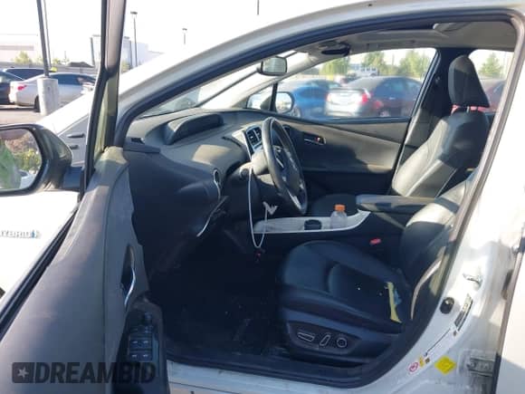 2016 Toyota Prius Four z VIN JTDKARFU7G3502954, wystawiony jako IAAI lot #42652179 z przebiegiem 219 669 mil mil oraz . Historia ofert i sprzedaży dostępna na DreamBid. Obrazek 5.