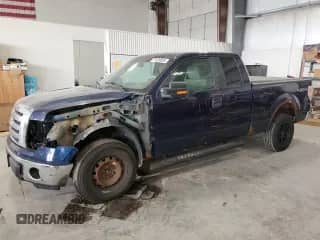2009 Ford F-150 XL with VIN 1FTPX14V59KB73469, listed as a Copart auction lot 71029885 with 165,336 mi miles and Salvage title. Bid and sale history available at DreamBid. Image 1.