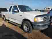 2000 Ford F-150 with VIN 2FTZX1721YCB17221, listed as a Copart auction lot 86729065 with 138,188 mi miles and Clean title. Bid and sale history available at DreamBid. Image 4.