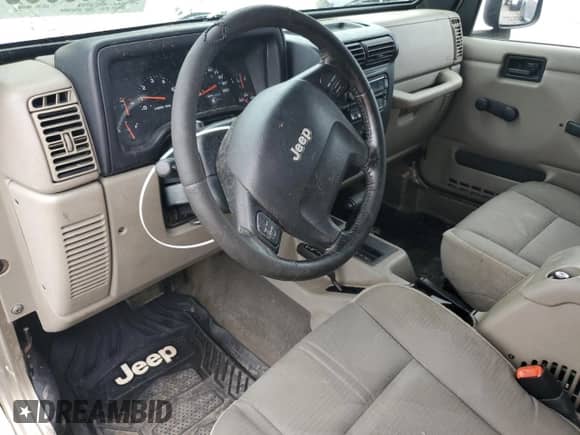 2004 Jeep Wrangler Sahara с VIN 1J4FA59S84P801582, выставлен на аукционе Copart как лот 64183535 с пробегом 127 213 миль миль и Списание • Salvage title. История ставок и продаж доступна на DreamBid. Изображение 8.