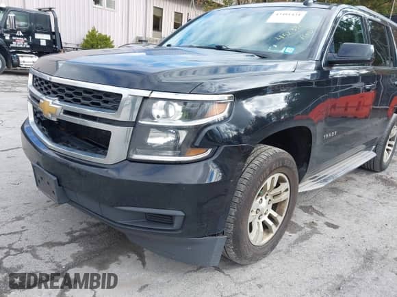 2015 Chevrolet Tahoe LS z VIN 1GNSKAKC6FR578745, wystawiony jako IAAI lot #43481431 z przebiegiem 452 330 mil mil oraz . Historia ofert i sprzedaży dostępna na DreamBid. Obrazek 6.