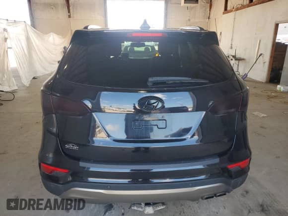 2017 Hyundai Santa Fe Ultimate z VIN 5XYZWDLA8HG466296, wystawiony jako Copart lot #65966405 z przebiegiem 146 930 mil mil oraz Szkoda całkowita • Salvage title. Historia ofert i sprzedaży dostępna na DreamBid. Obrazek 6.