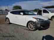 2012 Hyundai Veloster w/Black Int z VIN KMHTC6AD1CU037673, wystawiony jako Copart lot #71550475 z przebiegiem 204 000 mil mil oraz Szkoda całkowita • Salvage title. Historia ofert i sprzedaży dostępna na DreamBid. Obrazek 4.