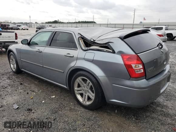 2006 Dodge Magnum R/T with VIN 2D4GV57246H200696, listed as a Copart auction lot 74246524 with 206,548 mi miles and Salvage title. Bid and sale history available at DreamBid. Image 2.