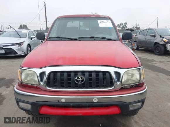 2004 Toyota Tacoma PreRunner z VIN 5TEGN92N94Z394990, wystawiony jako IAAI lot #43381672 z przebiegiem 334 266 mil mil oraz . Historia ofert i sprzedaży dostępna na DreamBid. Obrazek 12.