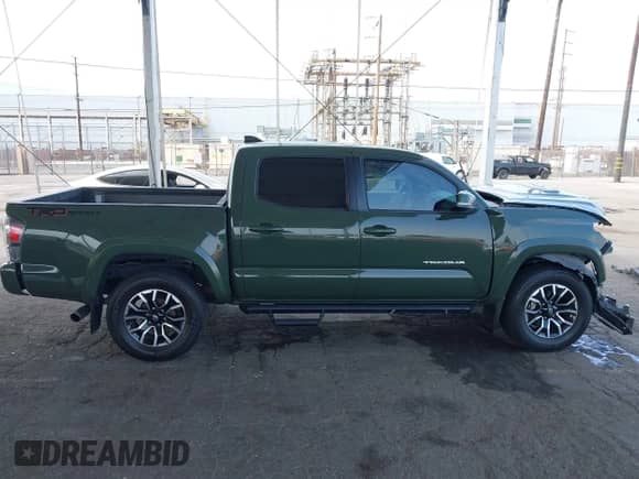 2022 Toyota Tacoma SR5 with VIN 3TMAZ5CN8NM180525, listed as a IAAI auction lot 42750259 with 52,414 mi miles and . Bid and sale history available at DreamBid. Image 14.