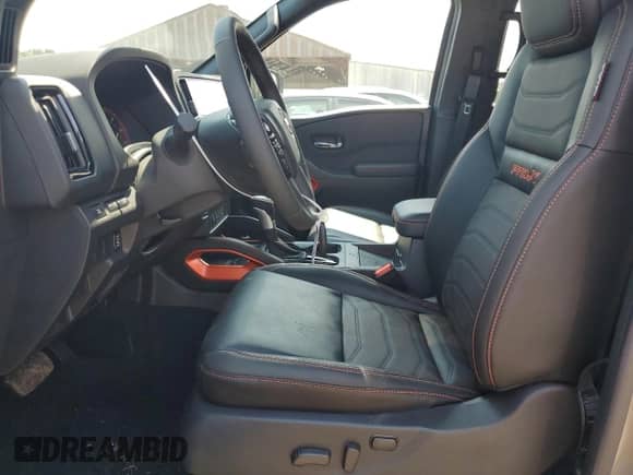 2025 Nissan Frontier Pro-X with VIN 1N6ED1EJ8SN620115, listed as a Copart auction lot 67518565 with 211 mi miles and Salvage title. Bid and sale history available at DreamBid. Image 7.