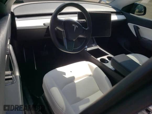 2021 Tesla Model Y Long Range with VIN 5YJYGDEE5MF257320, listed as a Copart auction lot 63980974 with 89,016 mi miles and Salvage title. Bid and sale history available at DreamBid. Image 8.