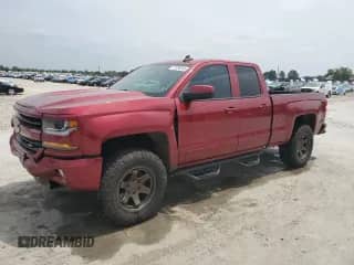 2018 Chevrolet Silverado 1500 LT with VIN 1GCVKREC0JZ332461, listed as a Copart auction lot 57056395 with 89,687 mi miles and Salvage title. Bid and sale history available at DreamBid. Image 1.