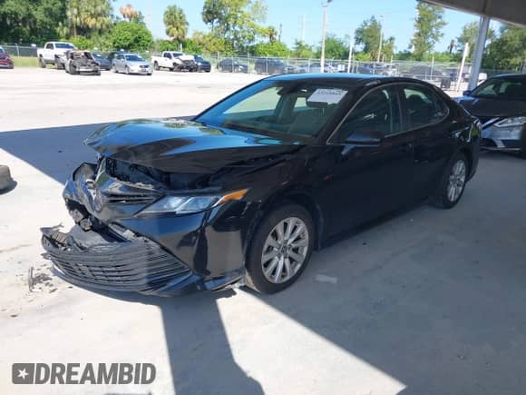 2020 Toyota Camry LE z VIN 4T1C11AK6LU378364, wystawiony jako IAAI lot #43218845 z przebiegiem 157 524 mil mil oraz . Historia ofert i sprzedaży dostępna na DreamBid. Obrazek 17.