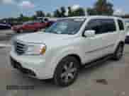 2015 Honda Pilot Touring z VIN 5FNYF4H95FB053508, wystawiony jako Copart lot #68702885 z przebiegiem 157 371 mil mil oraz Czysty tytuł • Clean title. Historia ofert i sprzedaży dostępna na DreamBid. Obrazek 1.