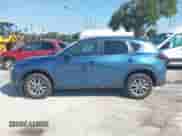 2023 Mazda CX-5 S Carbon Edition z VIN JM3KFBCM6P0112207, wystawiony jako IAAI lot #42747977 z przebiegiem 33 488 mil mil oraz . Historia ofert i sprzedaży dostępna na DreamBid. Obrazek 14.