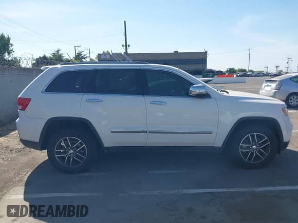 2013 Jeep Grand Cherokee Limited с VIN 1C4RJEBG5DC520596, выставлен на аукционе IAAI как лот 43164854 с пробегом 163 618 миль миль и . История ставок и продаж доступна на DreamBid. Изображение 13.
