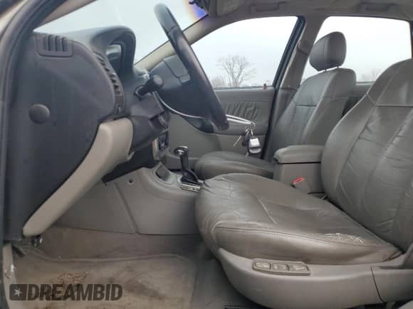 2003 Saturn LS with VIN 1G8JW54R33Y525353, listed as a Copart auction lot 86838924 with 142,254 mi miles and Salvage title. Bid and sale history available at DreamBid. Image 7.