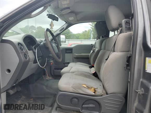 2007 Ford F-150 STX with VIN 1FTRX12W57NA42056, listed as a Copart auction lot 54569255 with 257,357 mi miles and Clean title. Bid and sale history available at DreamBid. Image 7.