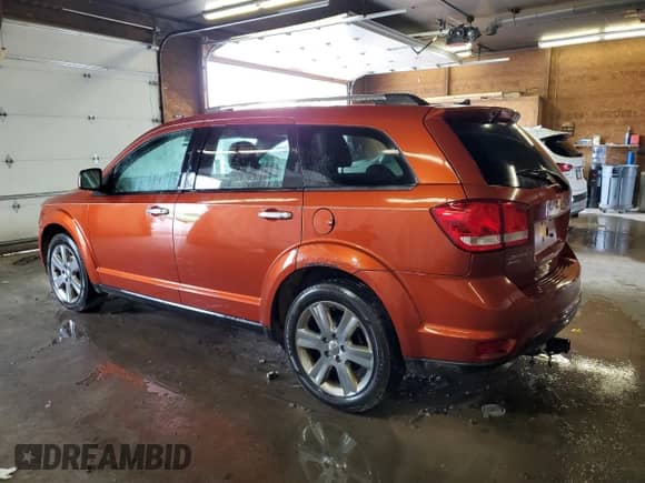 2012 Dodge Journey Crew with VIN 3C4PDDDG3CT224629, listed as a Copart auction lot 83854005 with 154,272 mi miles and Salvage title. Bid and sale history available at DreamBid. Image 2.