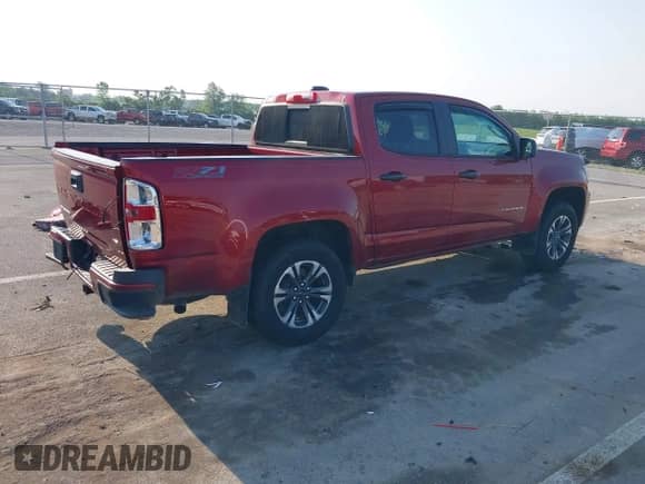 2021 Chevrolet Colorado 4WD Z71 z VIN 1GCGTDEN4M1113032, wystawiony jako IAAI lot #42410079 z przebiegiem 45 329 mil mil oraz . Historia ofert i sprzedaży dostępna na DreamBid. Obrazek 4.