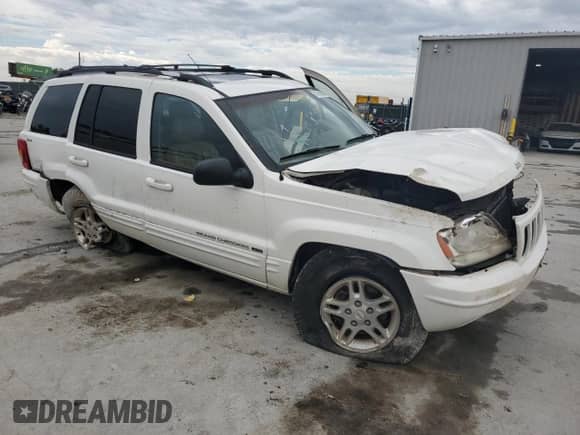 2000 Jeep Grand Cherokee Limited z VIN 1J4GW58N7YC136589, wystawiony jako Copart lot #81653575 z przebiegiem 122 365 mil mil oraz Szkoda całkowita • Salvage title. Historia ofert i sprzedaży dostępna na DreamBid. Obrazek 4.